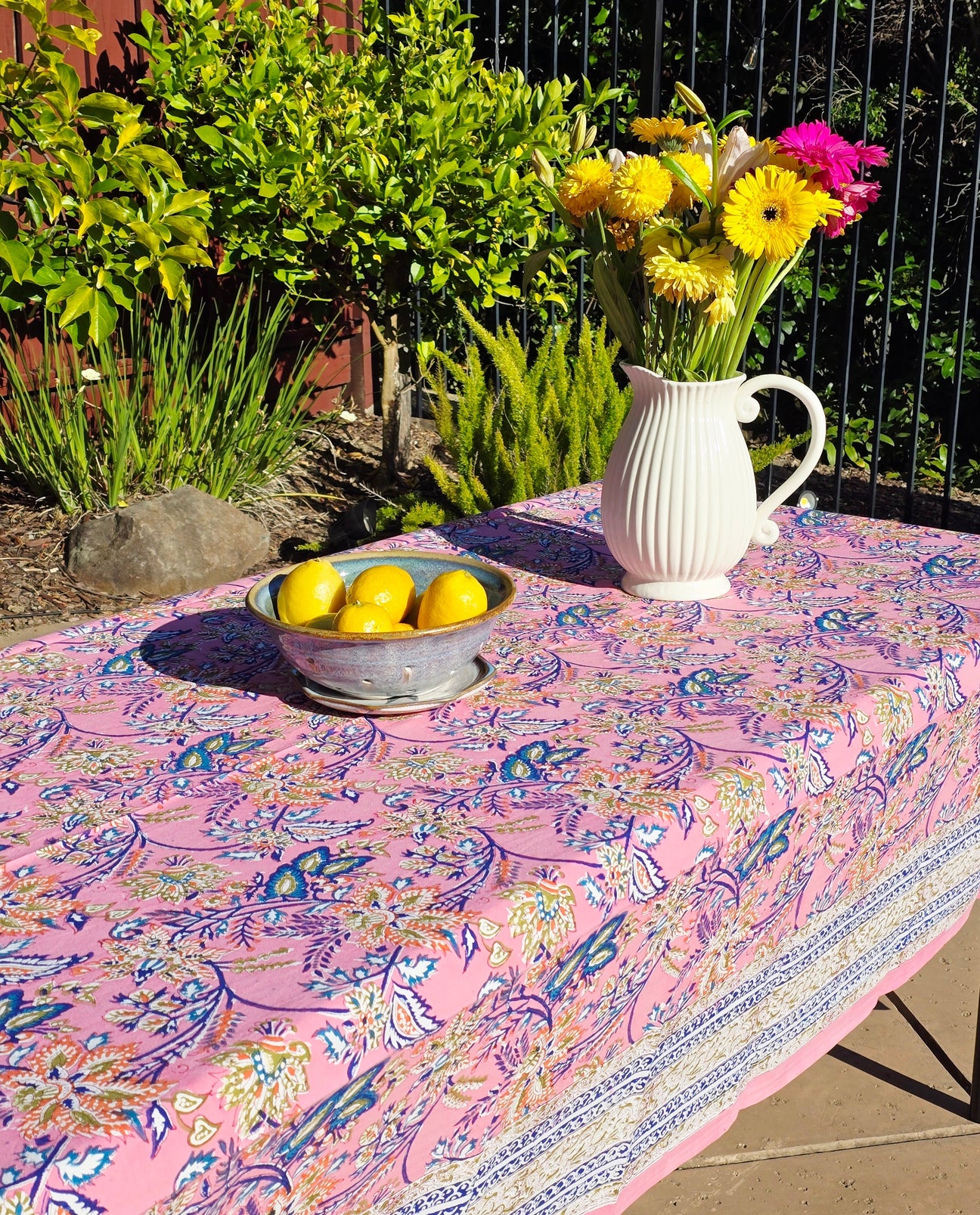 •	Styled table setting with block printed tablecloth