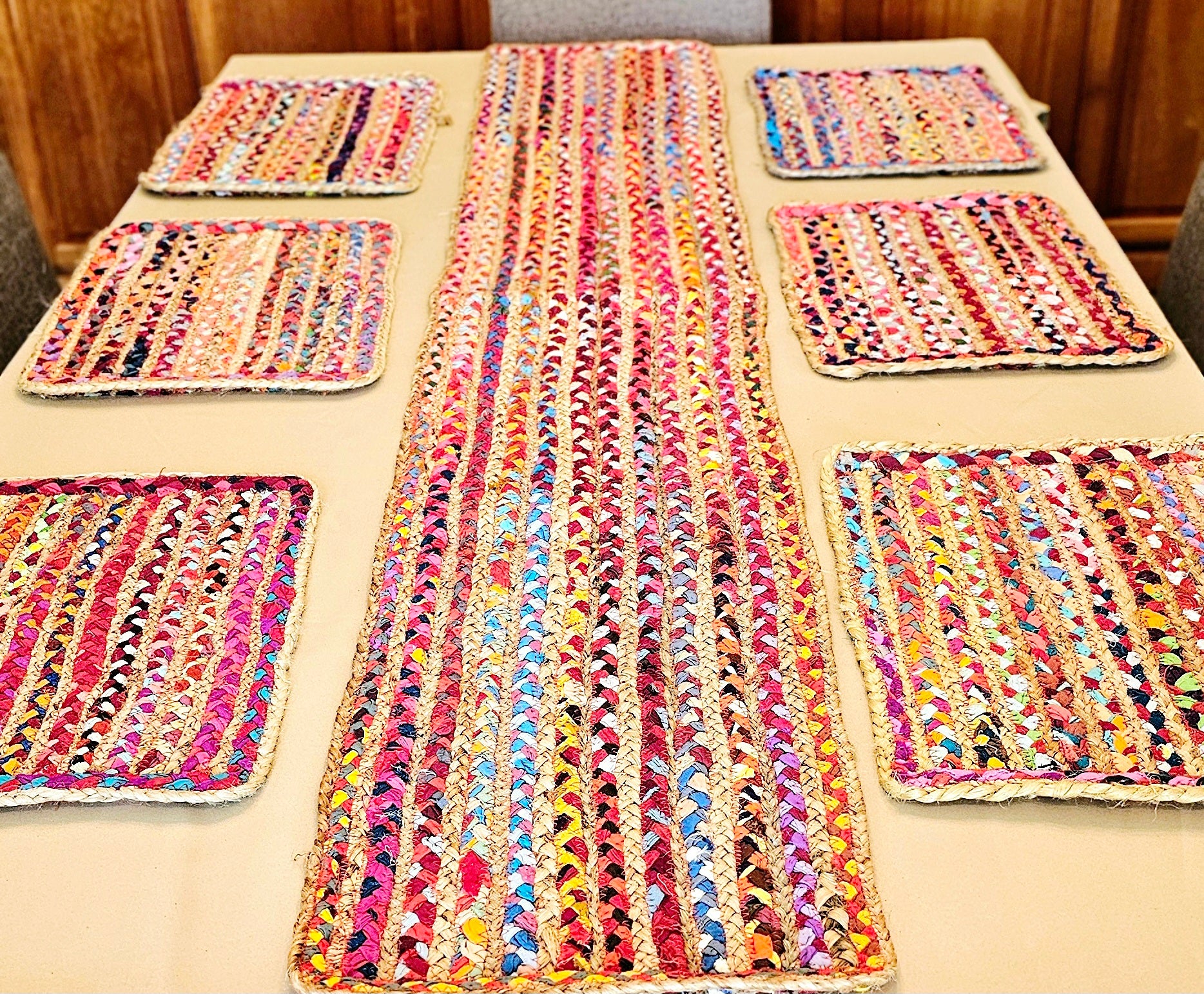 Colorful braided placemats on a table