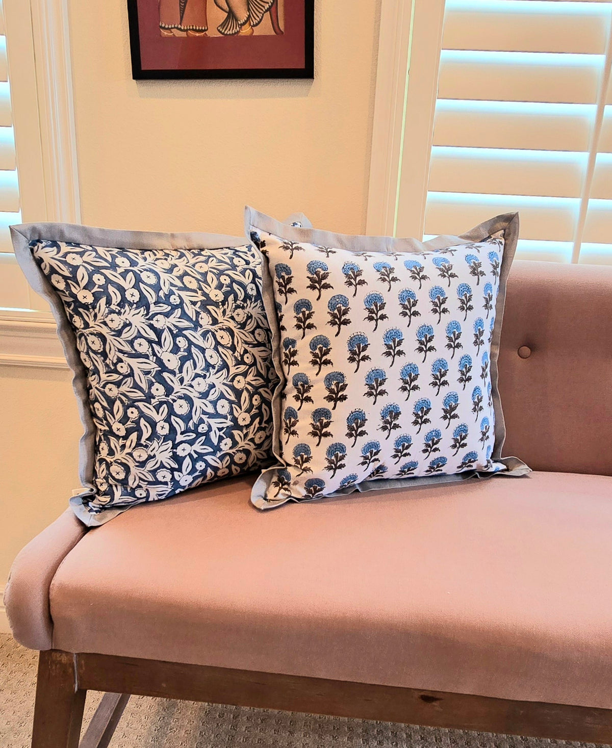 blue floral print on cushion cover placed on a sofa
