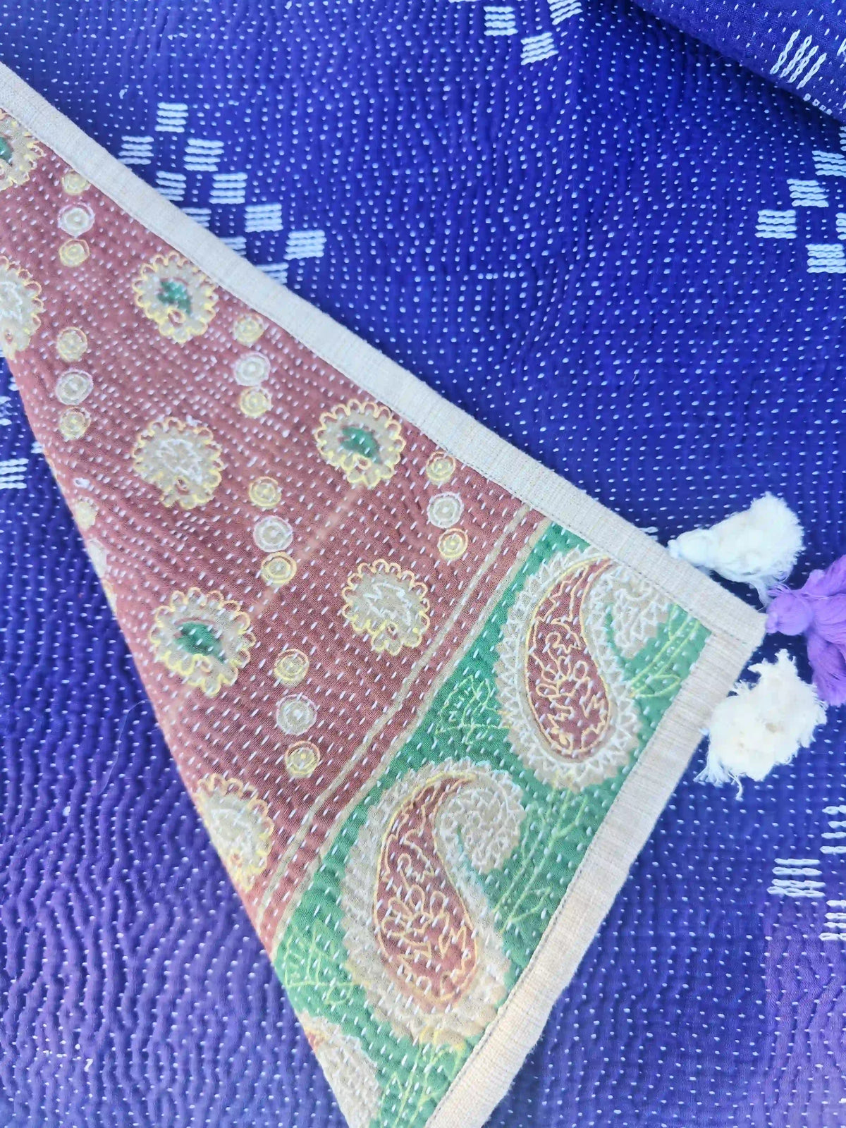 Reverse side of reversible kantha placemat showing alternate stitch pattern