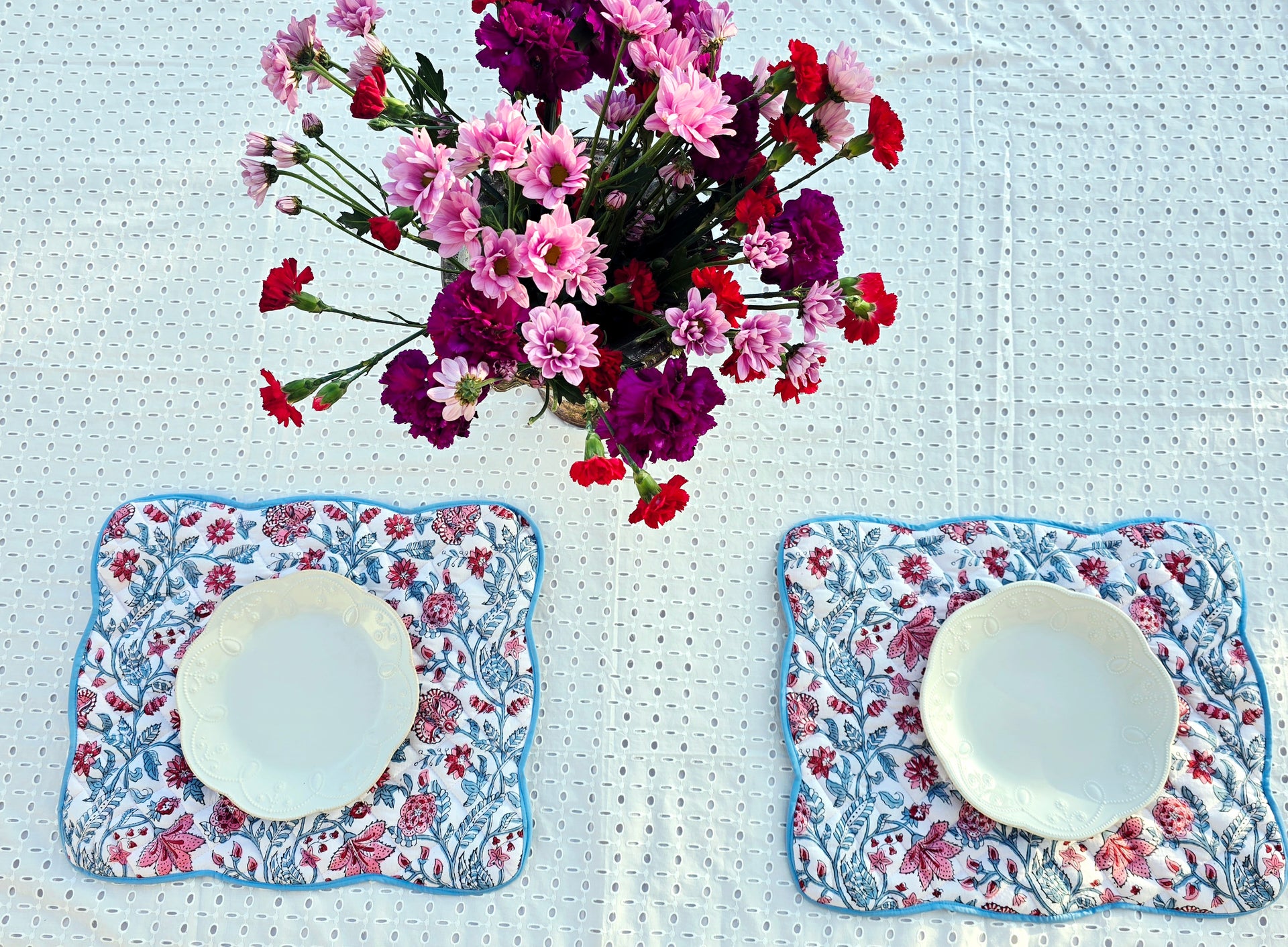 White floral block print cotton quilted placemat with scalloped edges for elegant dining
