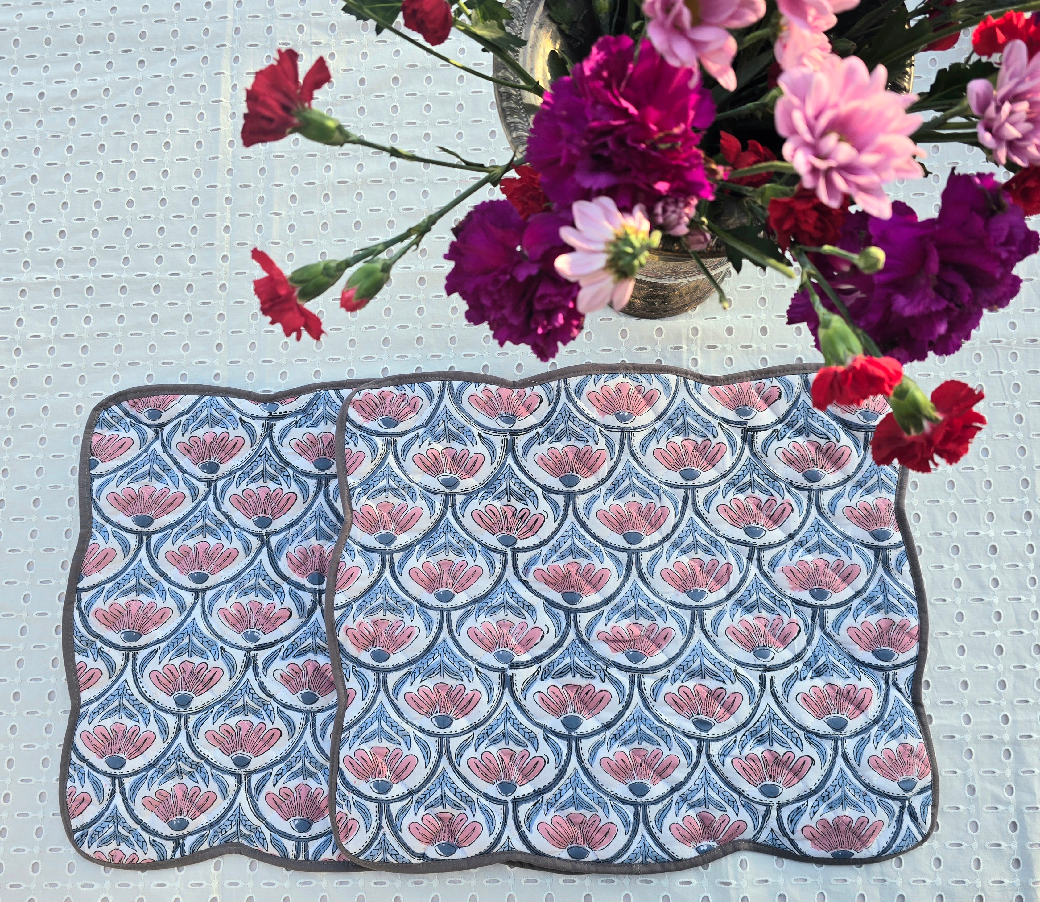 Hand quilted white floral cotton placemat with soft stitched texture