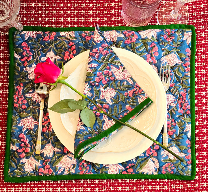 Floral blue quilted cotton placemat styled on dining table setting