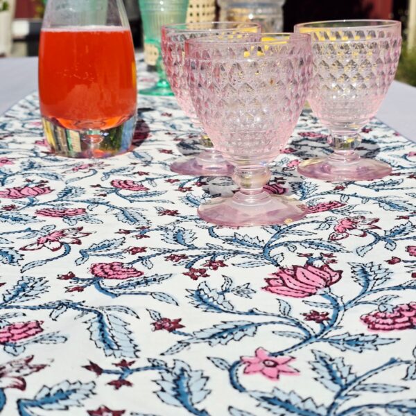 Hand block printed embroidered cotton table runner in pink floral on white – ethically made by artisans at Ohana Earth